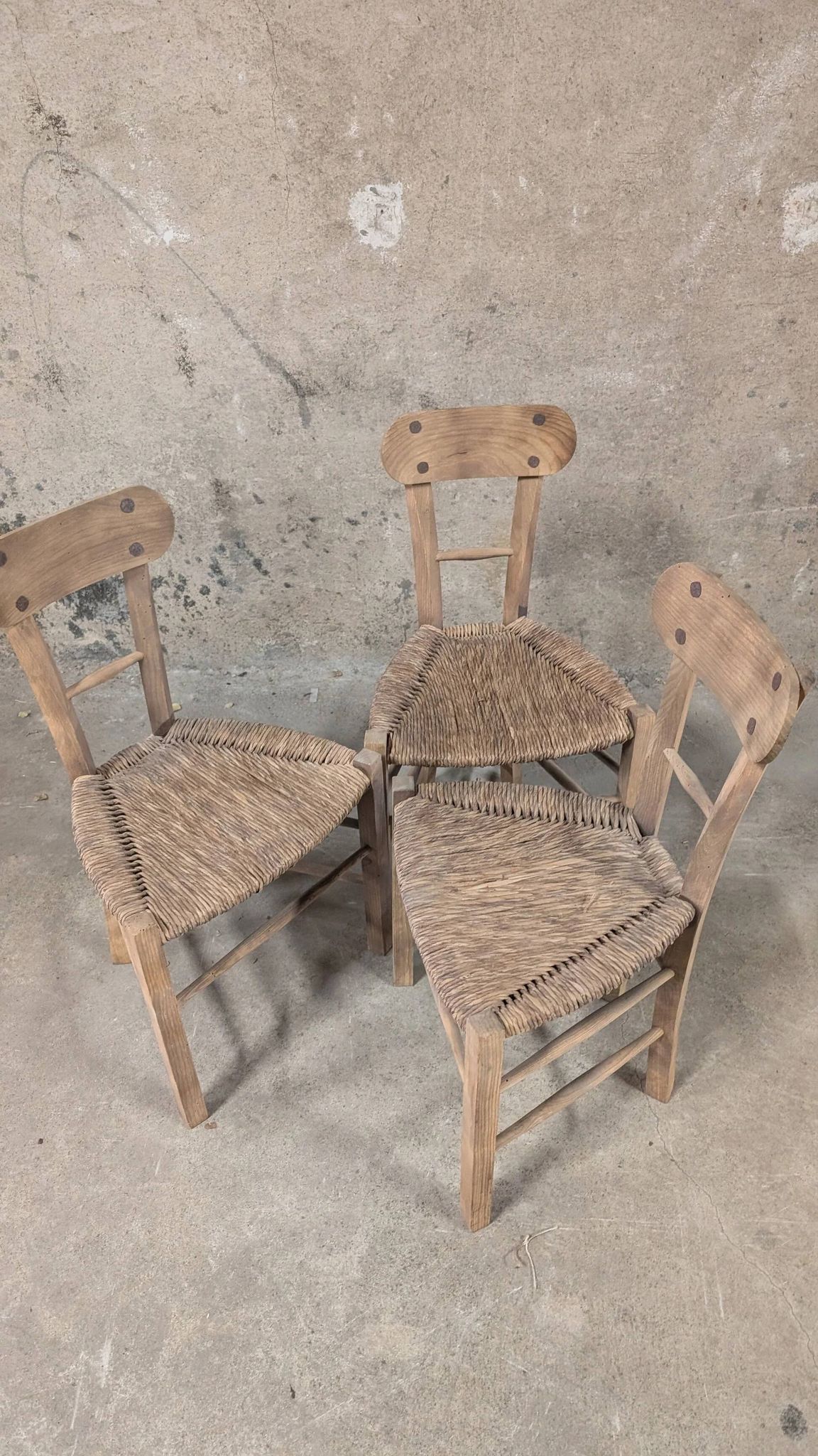 Set of 3 rustic wooden and woven straw chairs