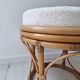 Pouf en rotin et tissu bouclette