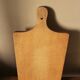 Wooden cutting board with handle
