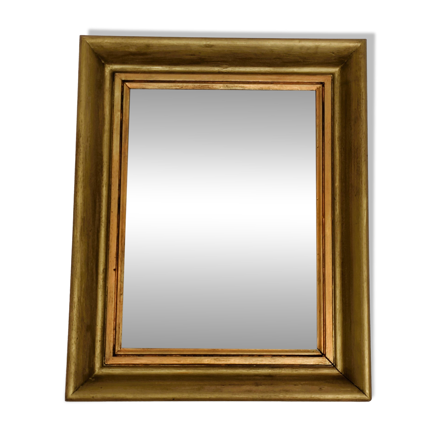 Antique mirror in gilded and copper wood