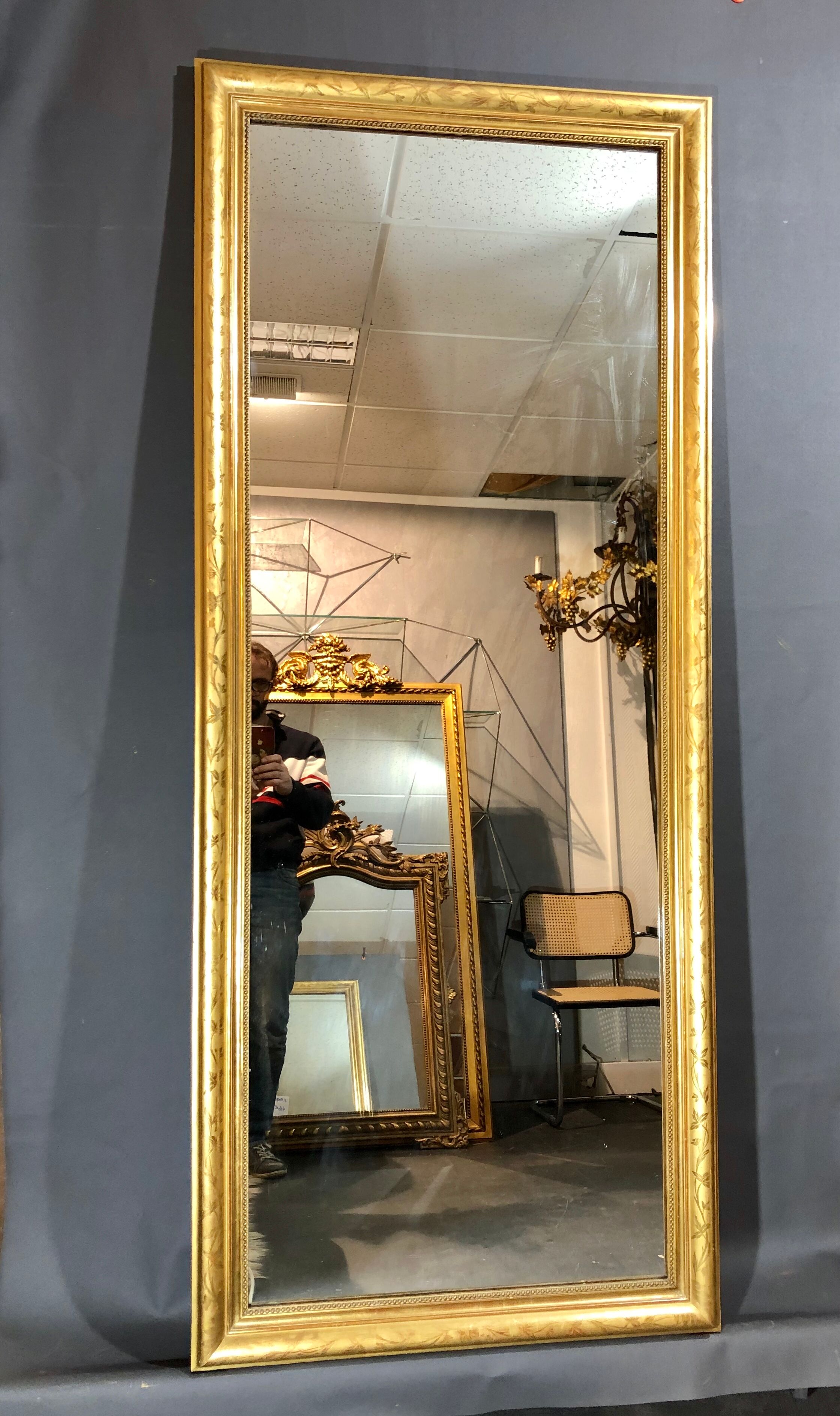 Miroir 190x80 d'époque Louis Philippe doré a la feuille d'or