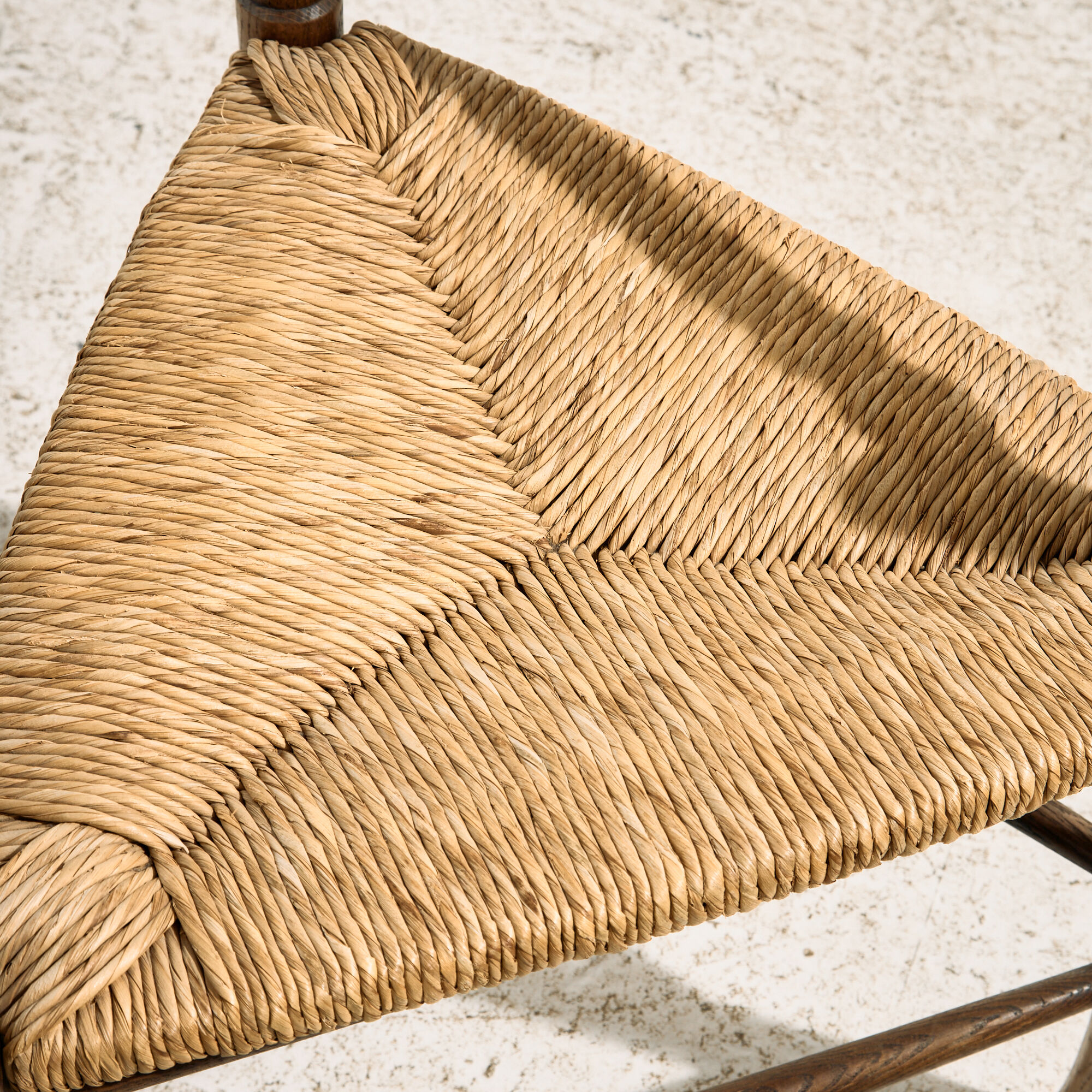 Oak armchair with three legs