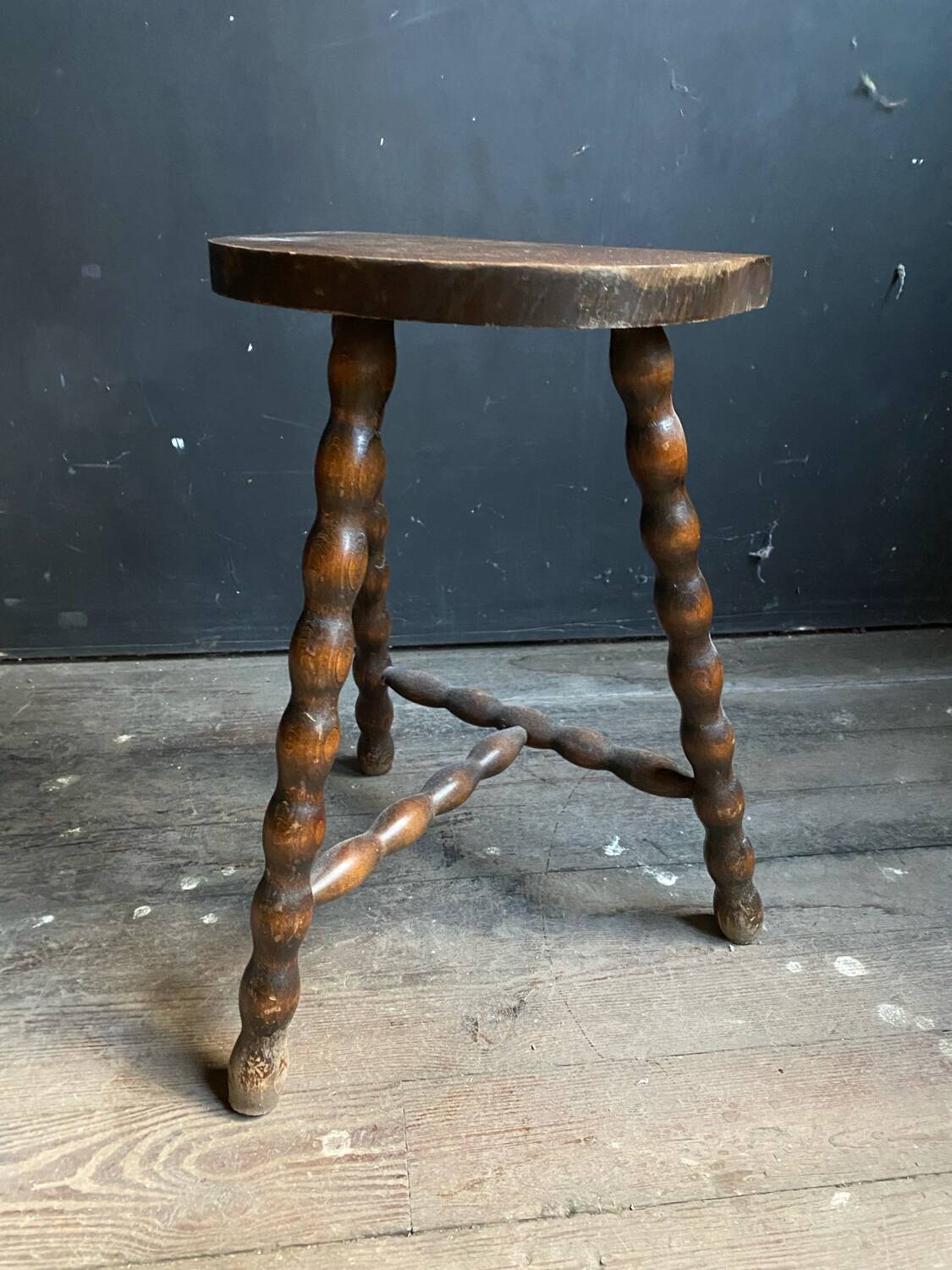 Half moon wooden milkman stool