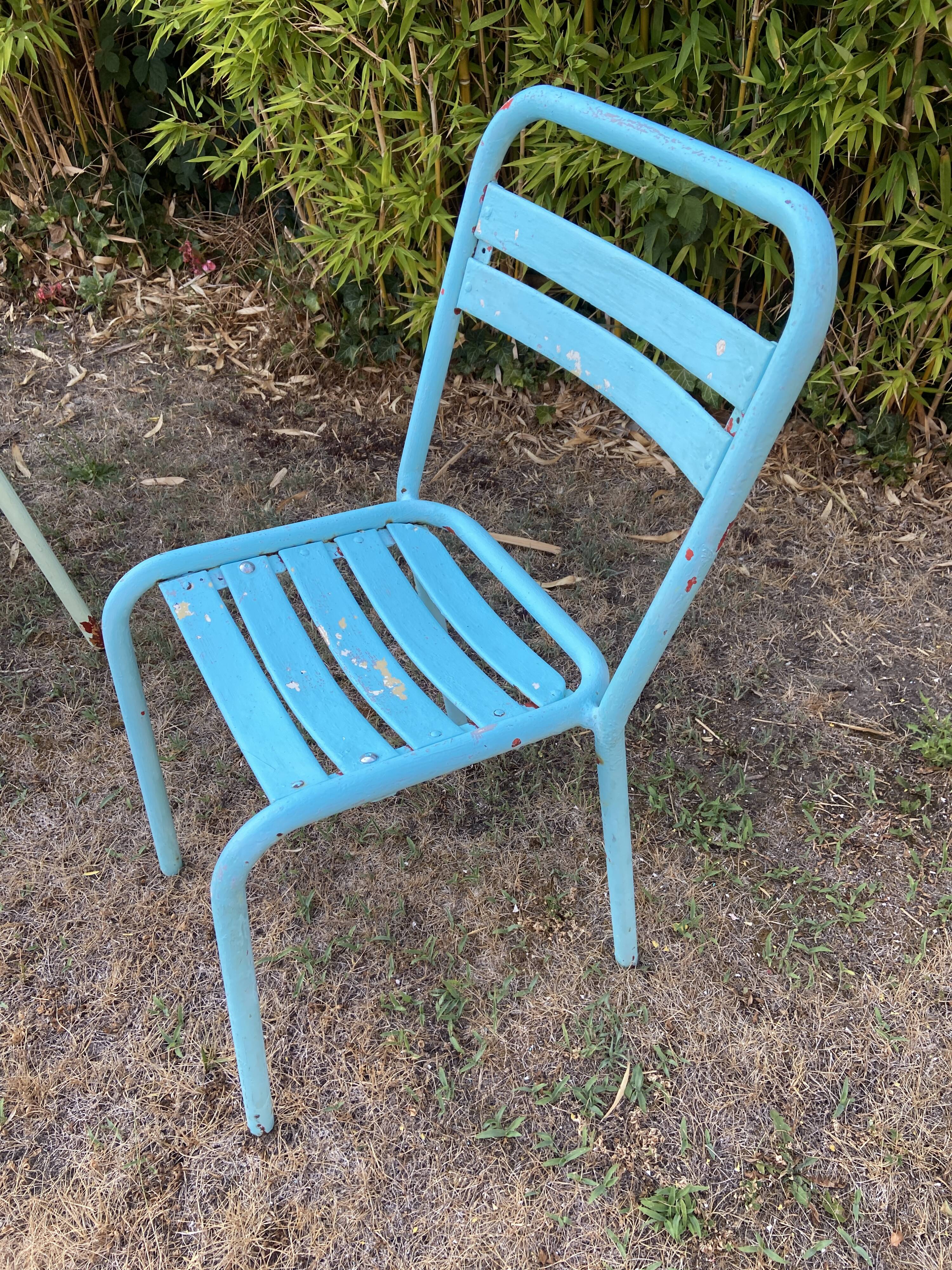 4 mismatched chairs Tolix brasserie bistro terrace French bistro 60s