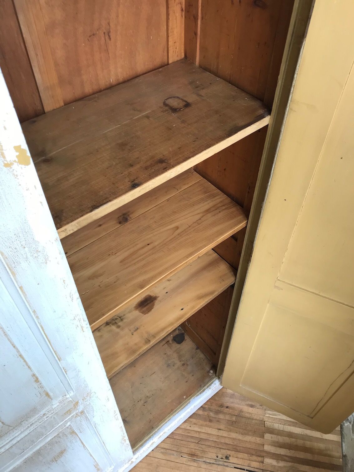 Antique wardrobe in patinated pine