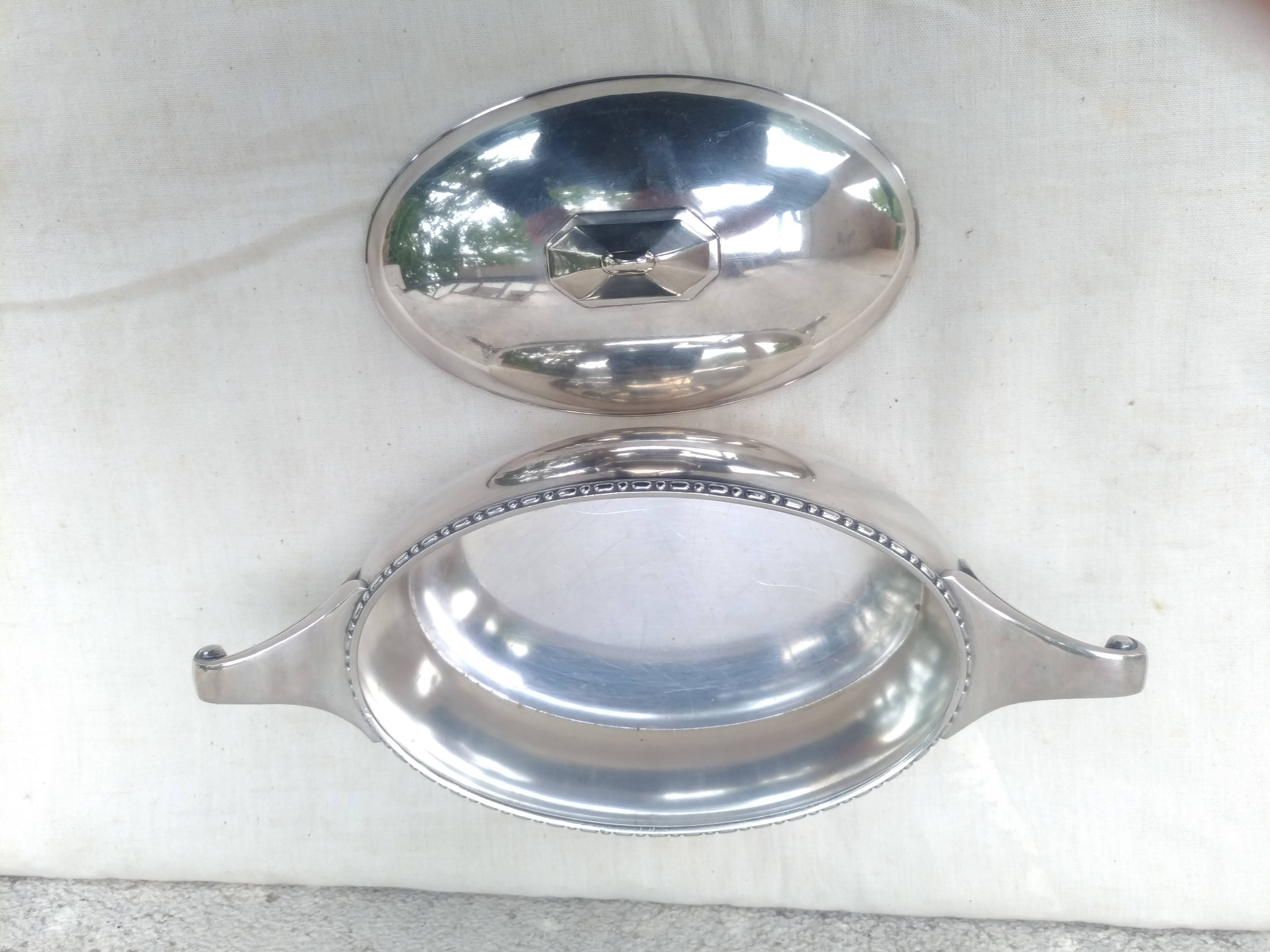 vegetable dish in silver metal