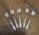 5 silver cake forks from the mid-20th century