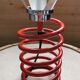 Red spring lamp foot