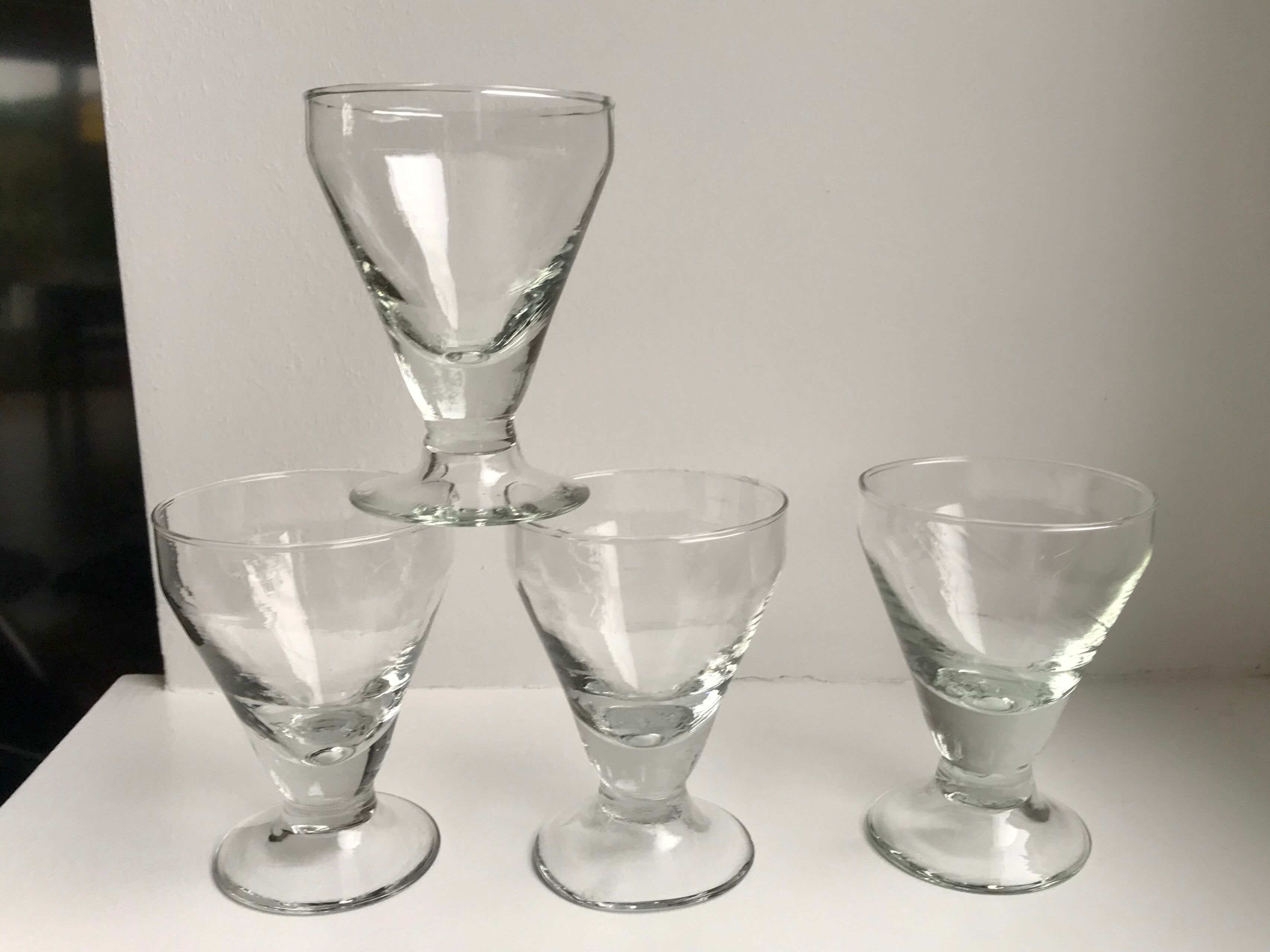 set of 5 glasses with thick bottom feet early twentieth century