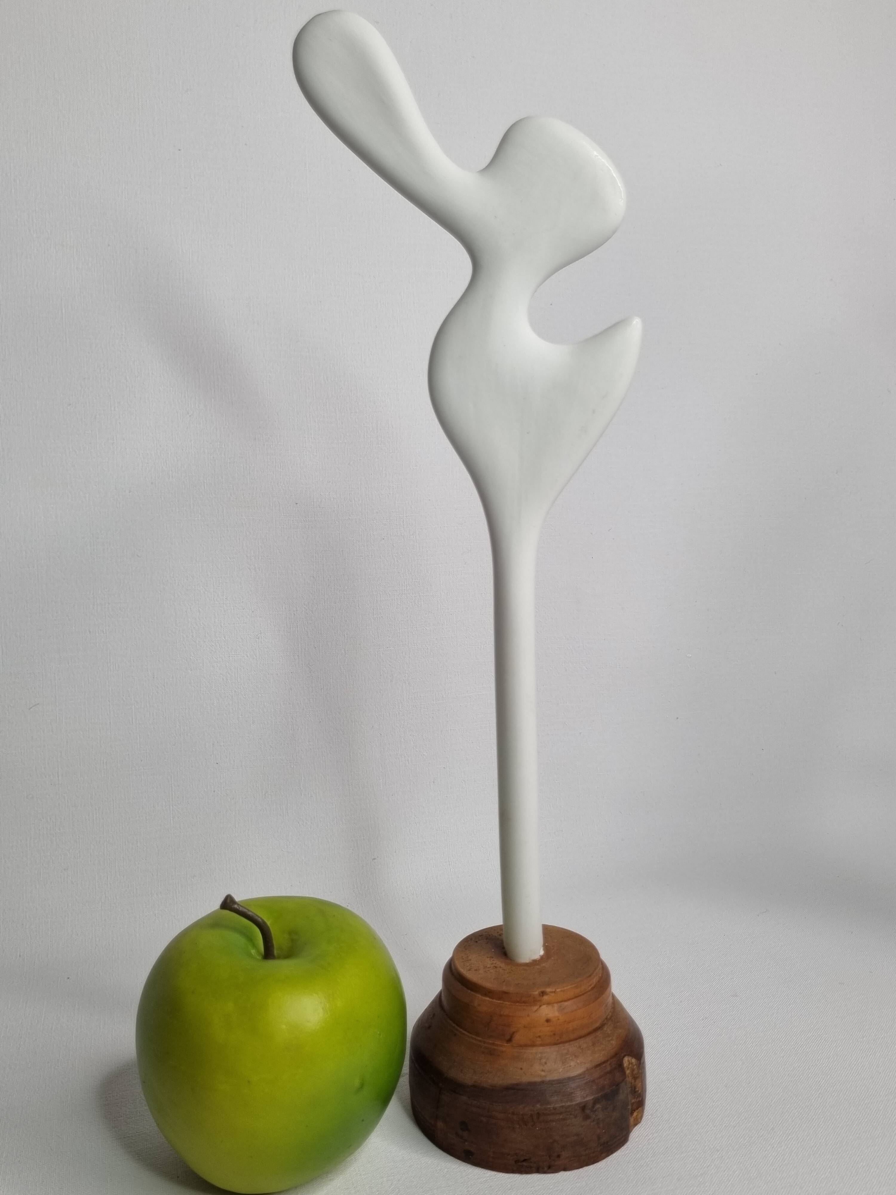 Biomorphic bisque sculpture, on turned wooden base, 37 cm