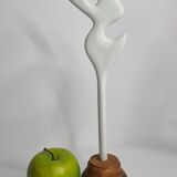 Biomorphic bisque sculpture, on turned wooden base, 37 cm