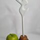 Biomorphic bisque sculpture, on turned wooden base, 37 cm