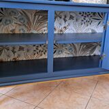 Buffet with red sweet sauce and blue garnish.