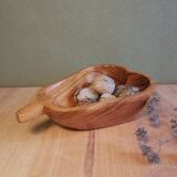 Empty wooden pocket in the shape of a vintage pear