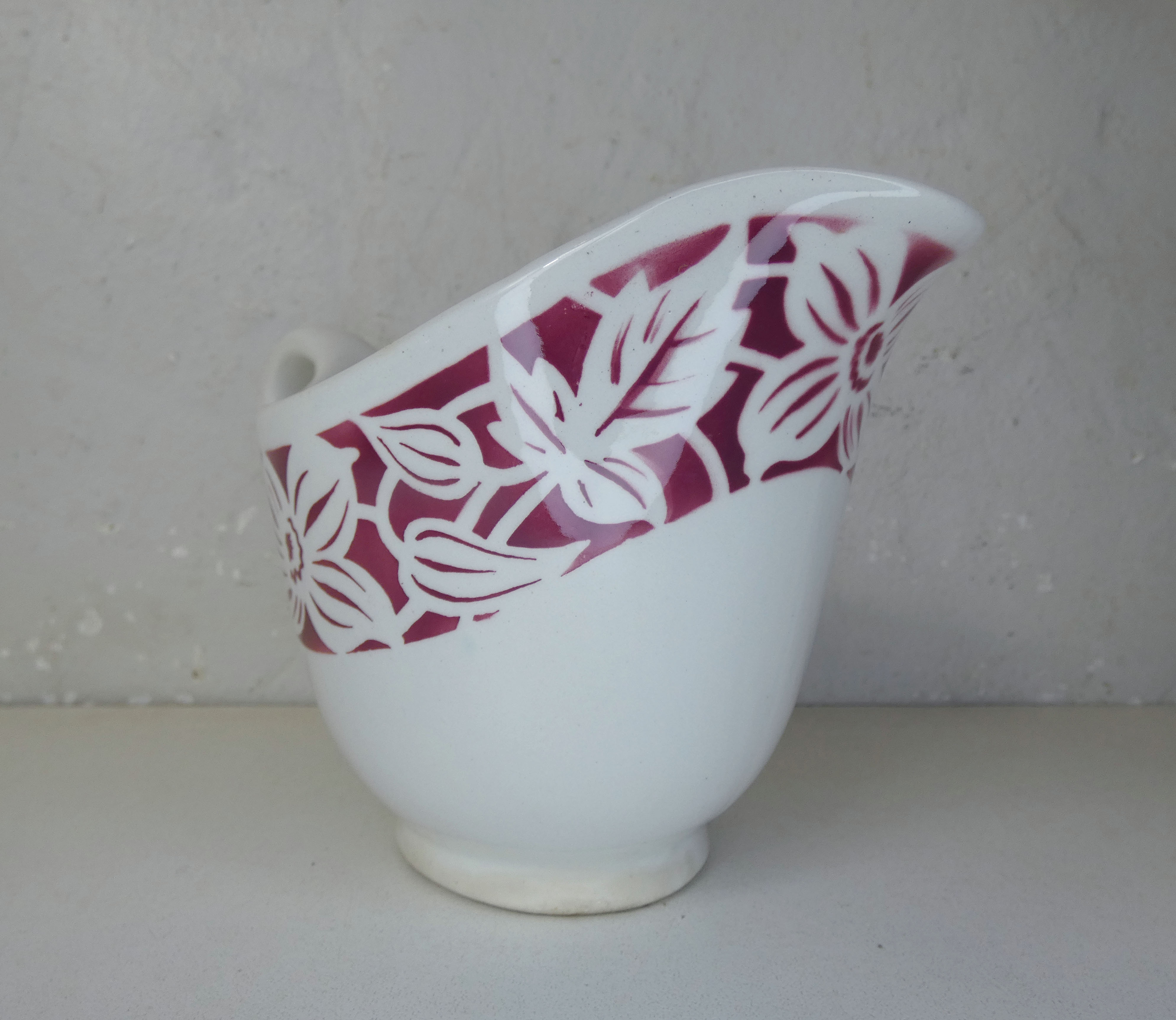 Old creamer milk pot in earthenware of Lunéville