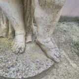 Antique reconstituted stone planter depicting a cherub
