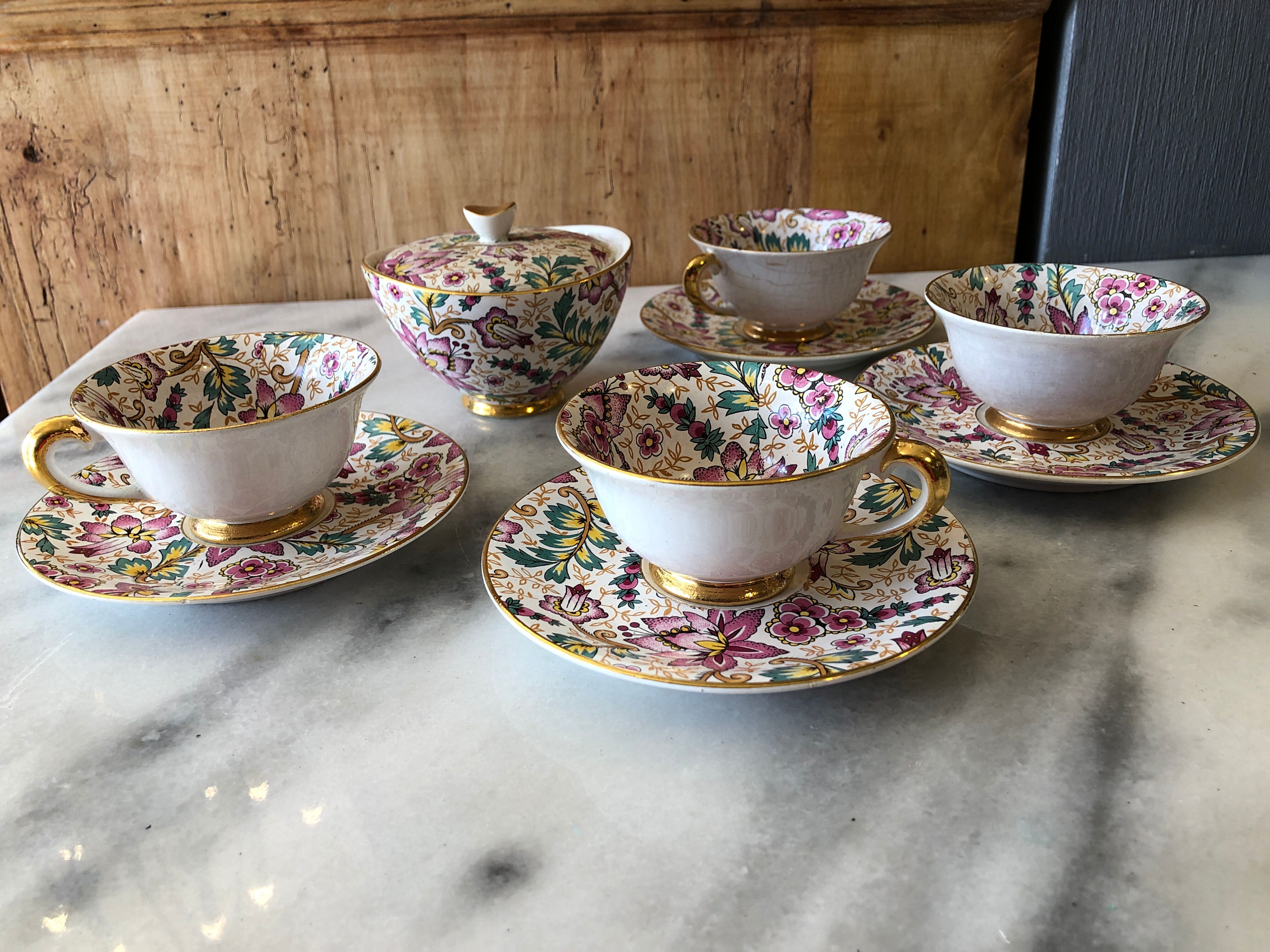 4 cups antique earthenware