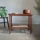Table basse porte revue vintage en teck et corde