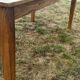Extendable farmhouse table in solid patinated oak
