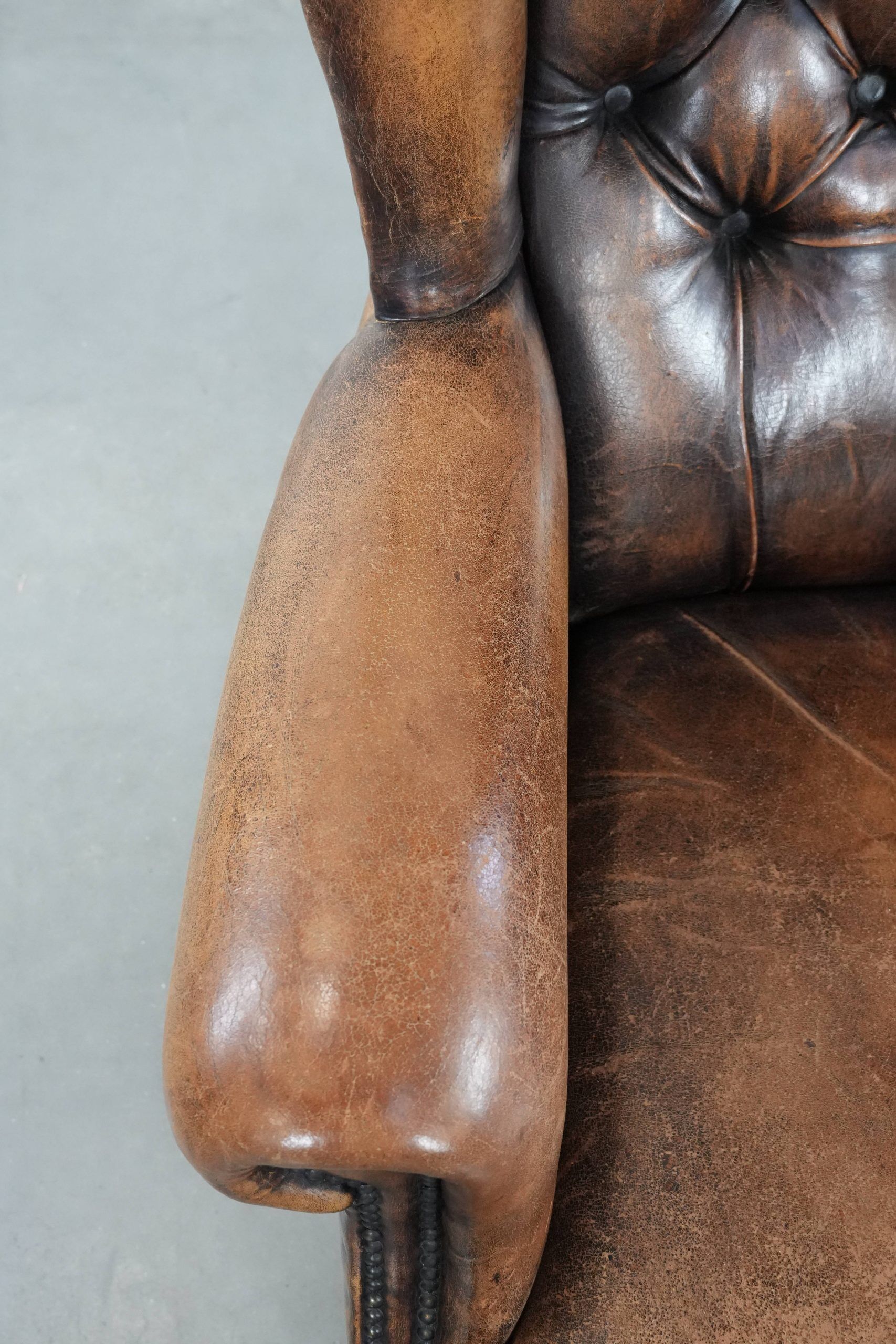 Unique large sheepskin Chesterfield wingback armchair in English style