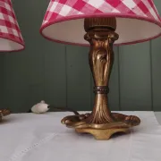 Pair of small lamps in gilded bronze by Petitot and red gingham lampshades.