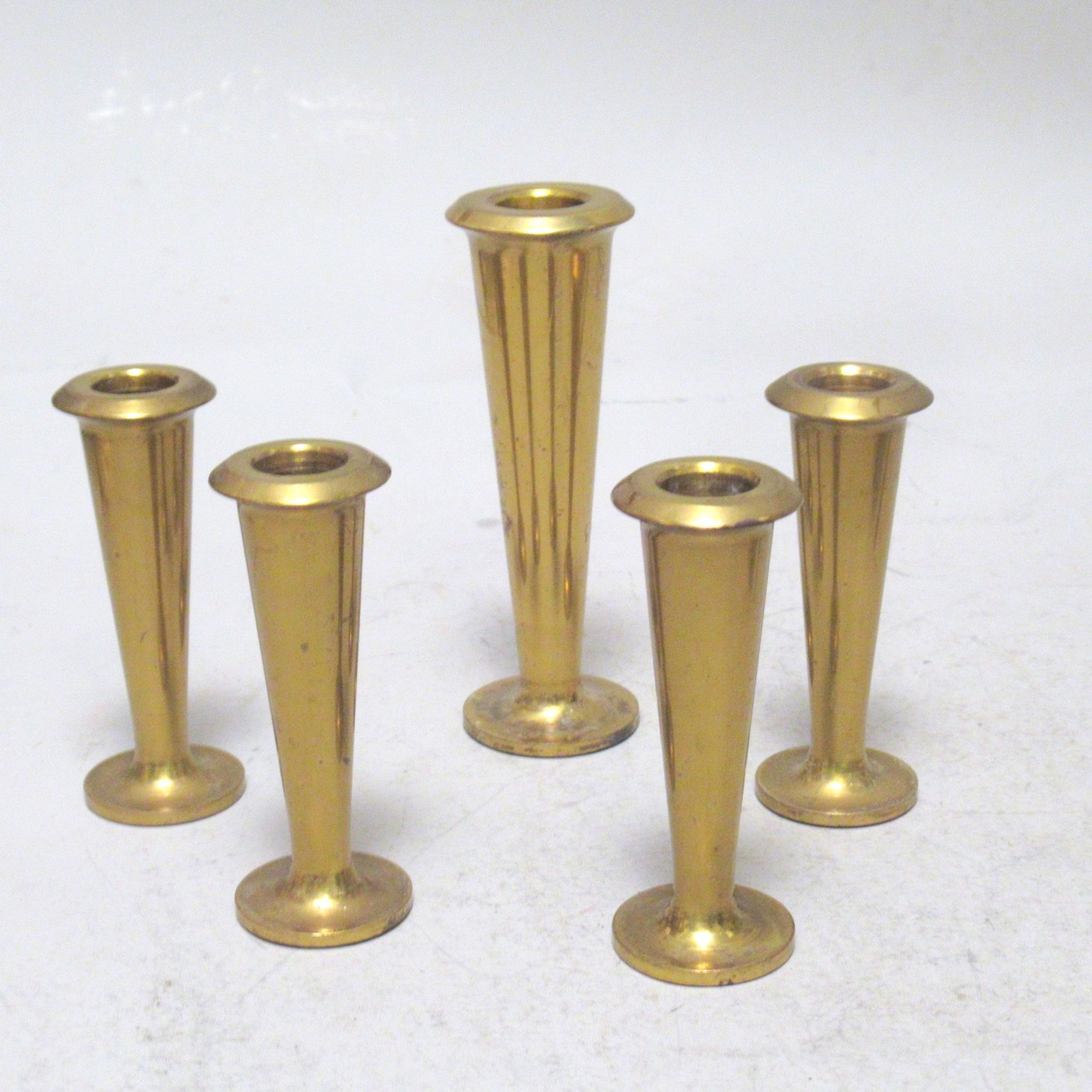 Five scandinavian brass candle holders 60s
