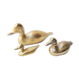 Trio of brass ducks