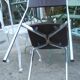 Vintage chrome metal chair and faux black leather
