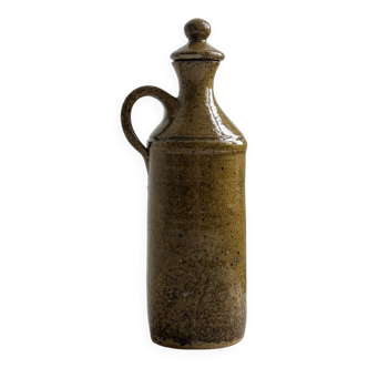 Decorative bottle handmade in old stoneware.