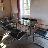 Dining table set with 6 Pieff chairs.