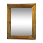 Degas profile mirror in patinated gilded wood  49x61cm