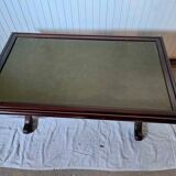 Living room coffee table with green leather and wood top