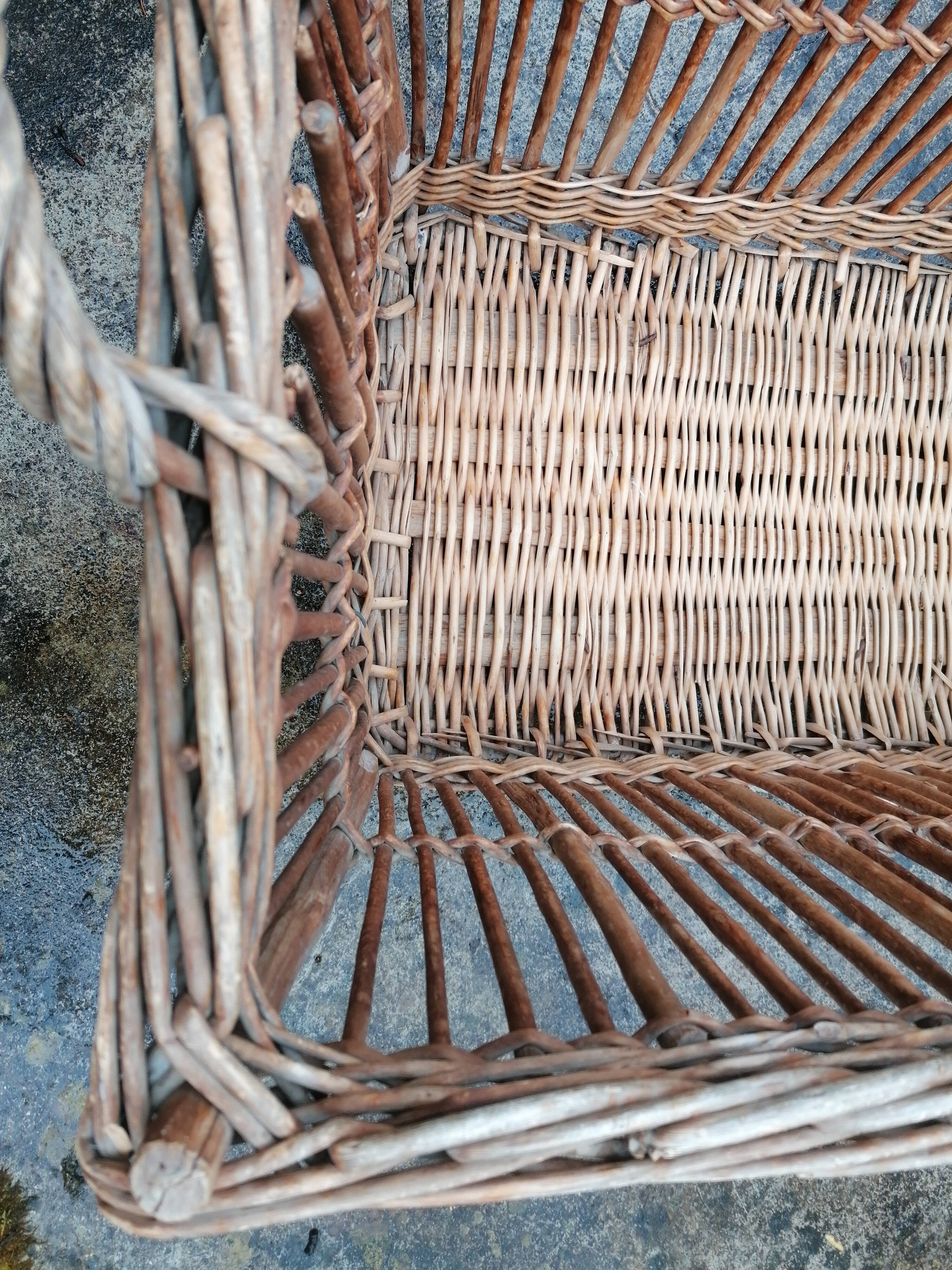 Antique wicker laundry basket