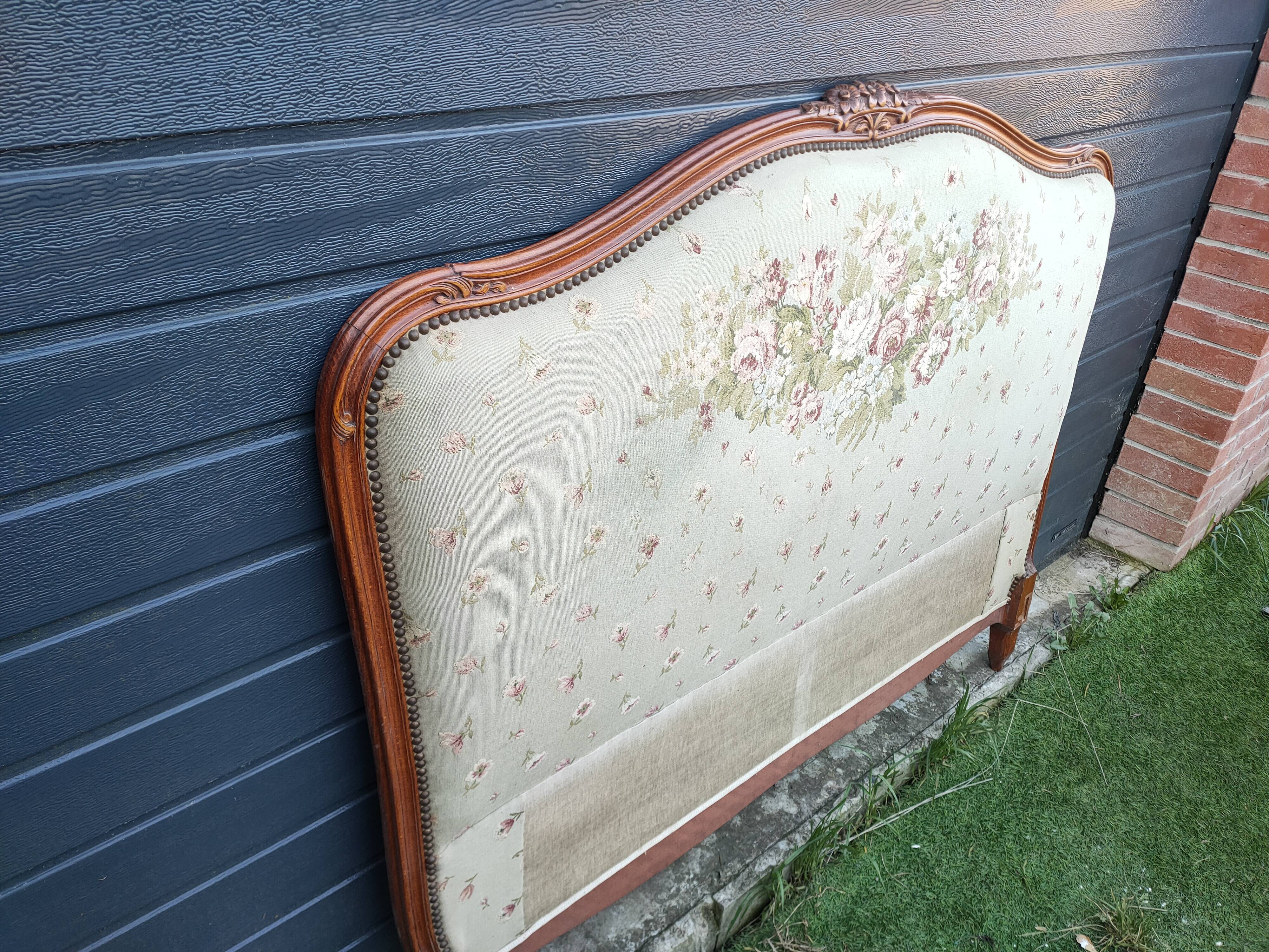 antique fabric and wood headboard