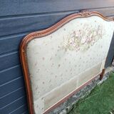 antique fabric and wood headboard