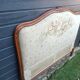 antique fabric and wood headboard