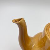 Yellow ceramic teapot