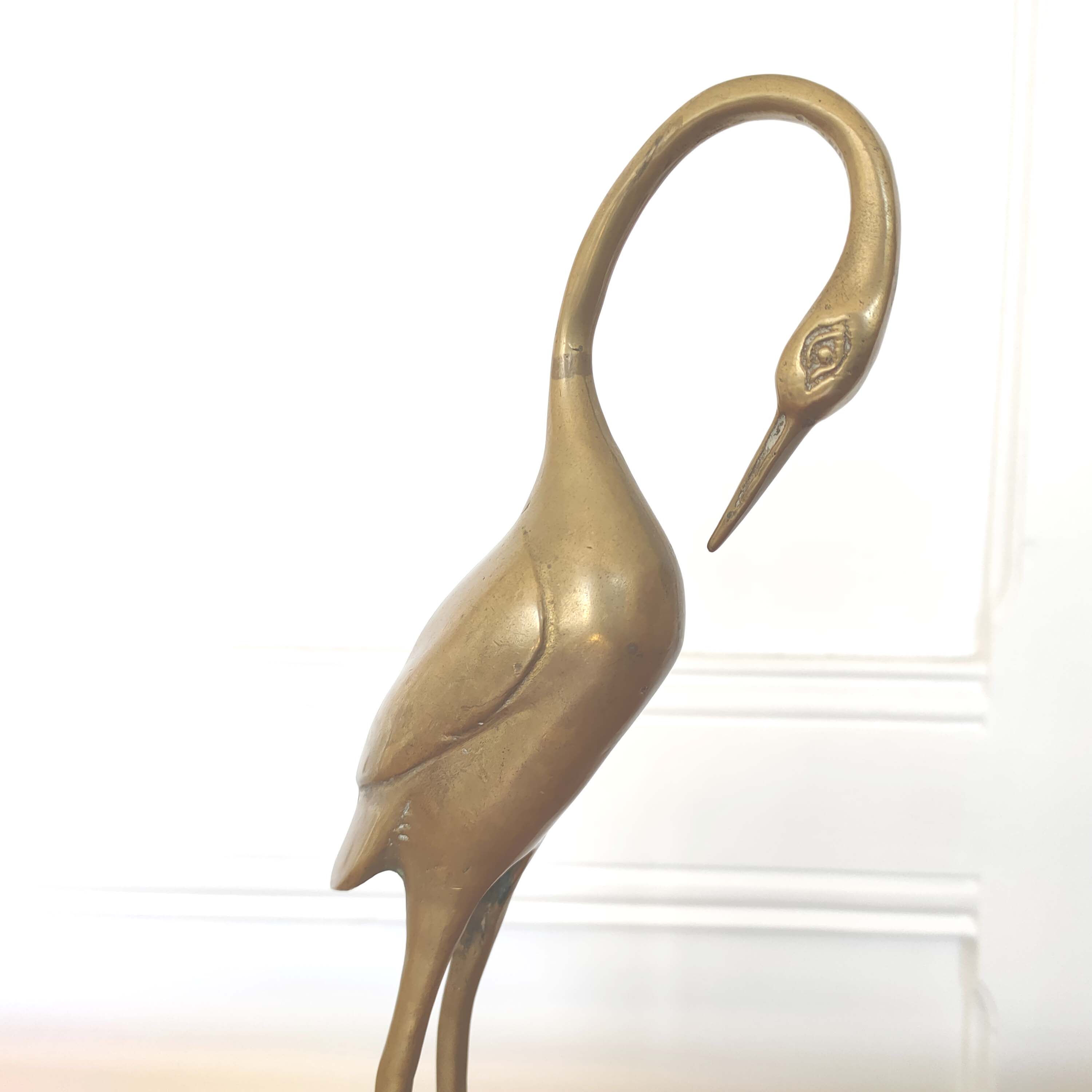 Brass heron
