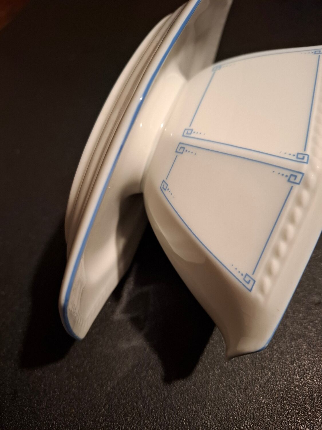 Dishes and porcelain sauceboat