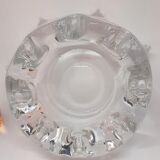 Empty ashtray-pockets in star-shaped crystal