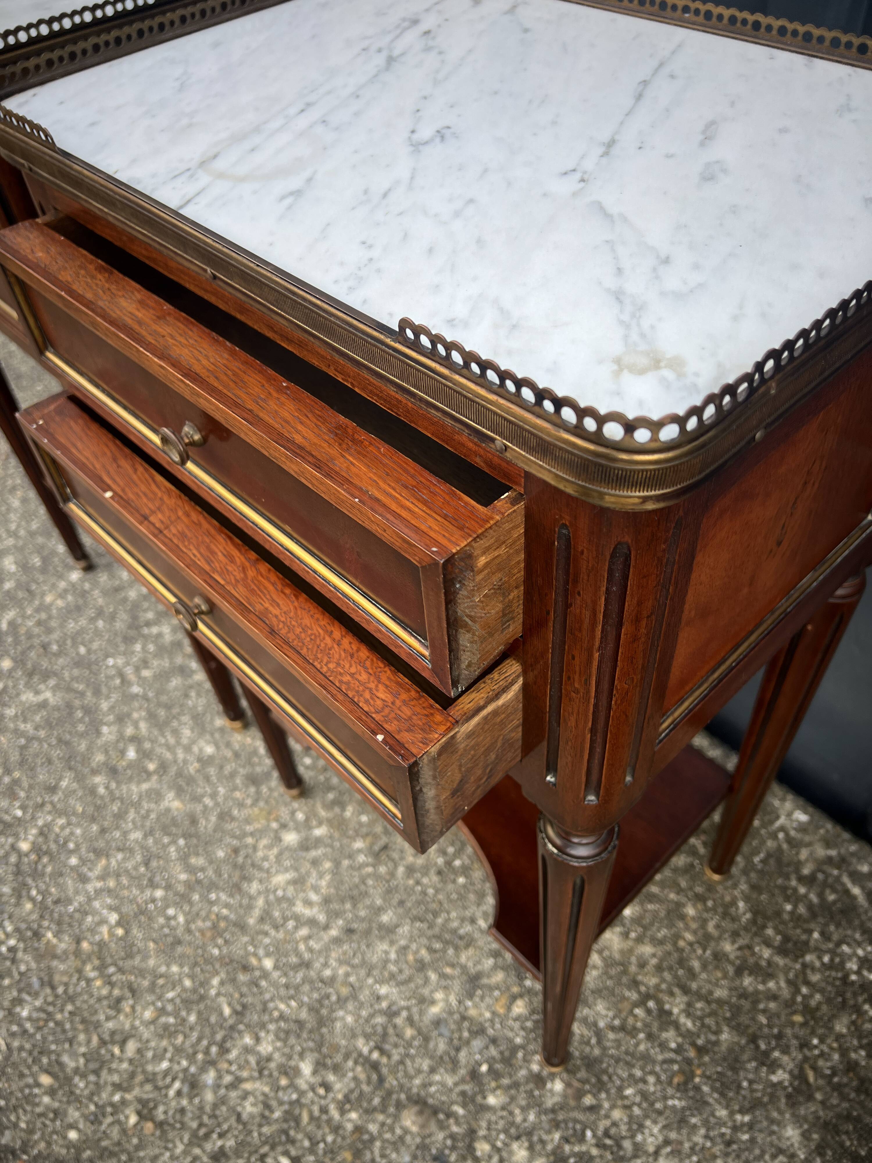 Pair of mahogany bedside tables, marble top, Louis XVI style