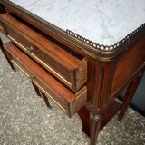 Pair of mahogany bedside tables, marble top, Louis XVI style