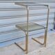 End table in gold metal and smoked glass