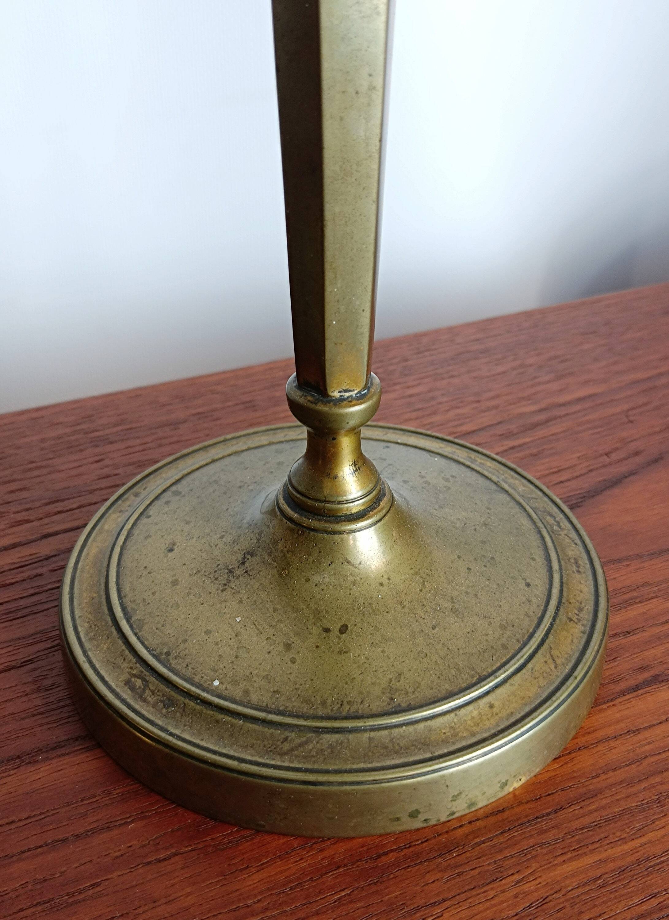 Pair of brass candlesticks, 19th century, neoclassical style.