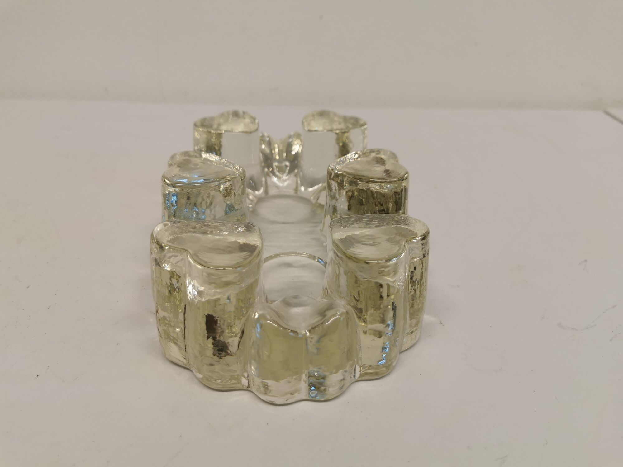 Candlestick in hard pressed glass with space for two candles