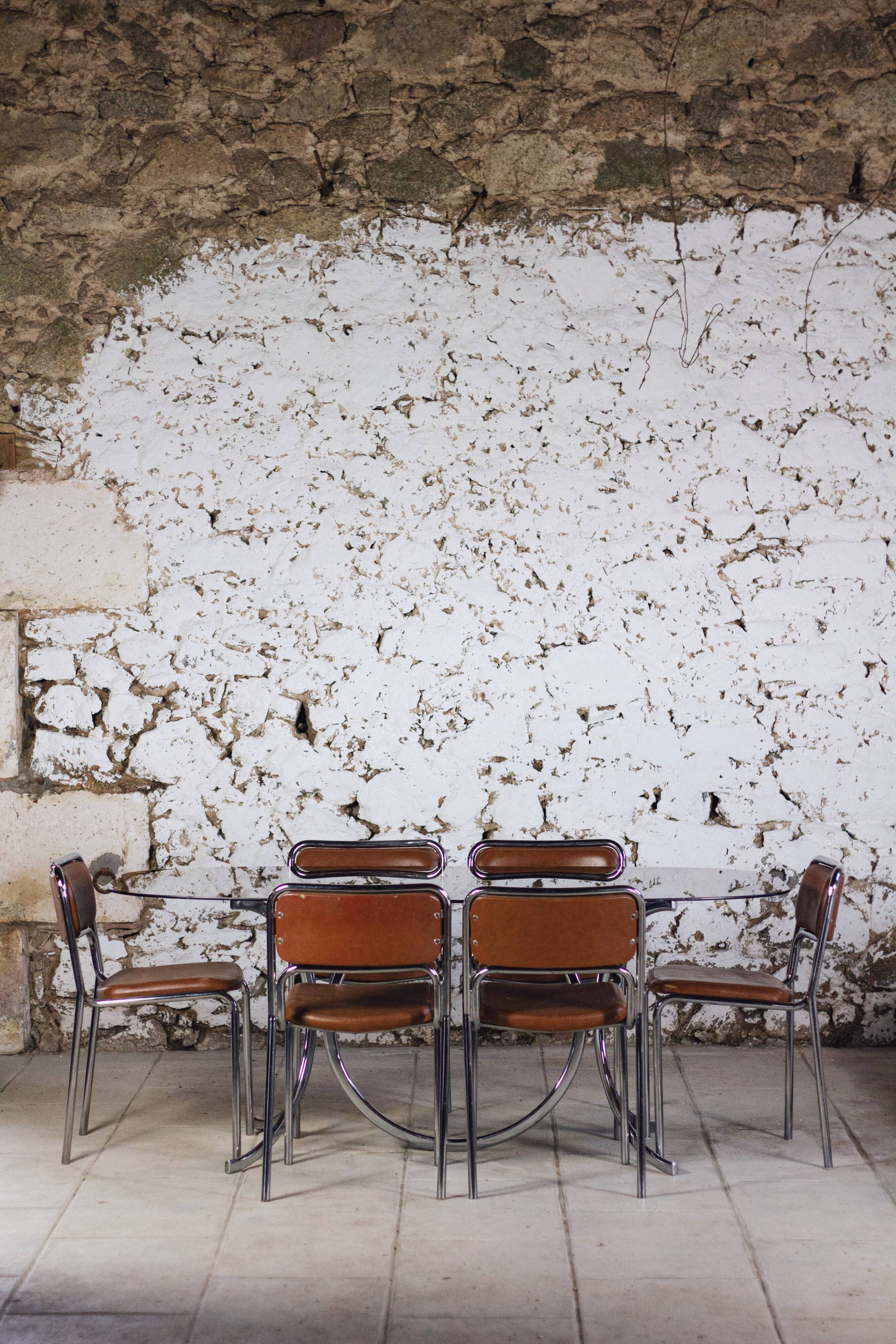 8 vintage tubular chrome and skai chairs, 1970