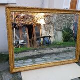 Grand golden mirror in louis xvi style