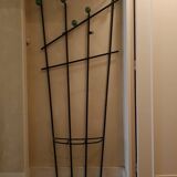 Wall-mounted metal coat rack