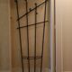 Wall-mounted metal coat rack