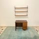 Shelves in rosewood and black lacquered metal from the 50s